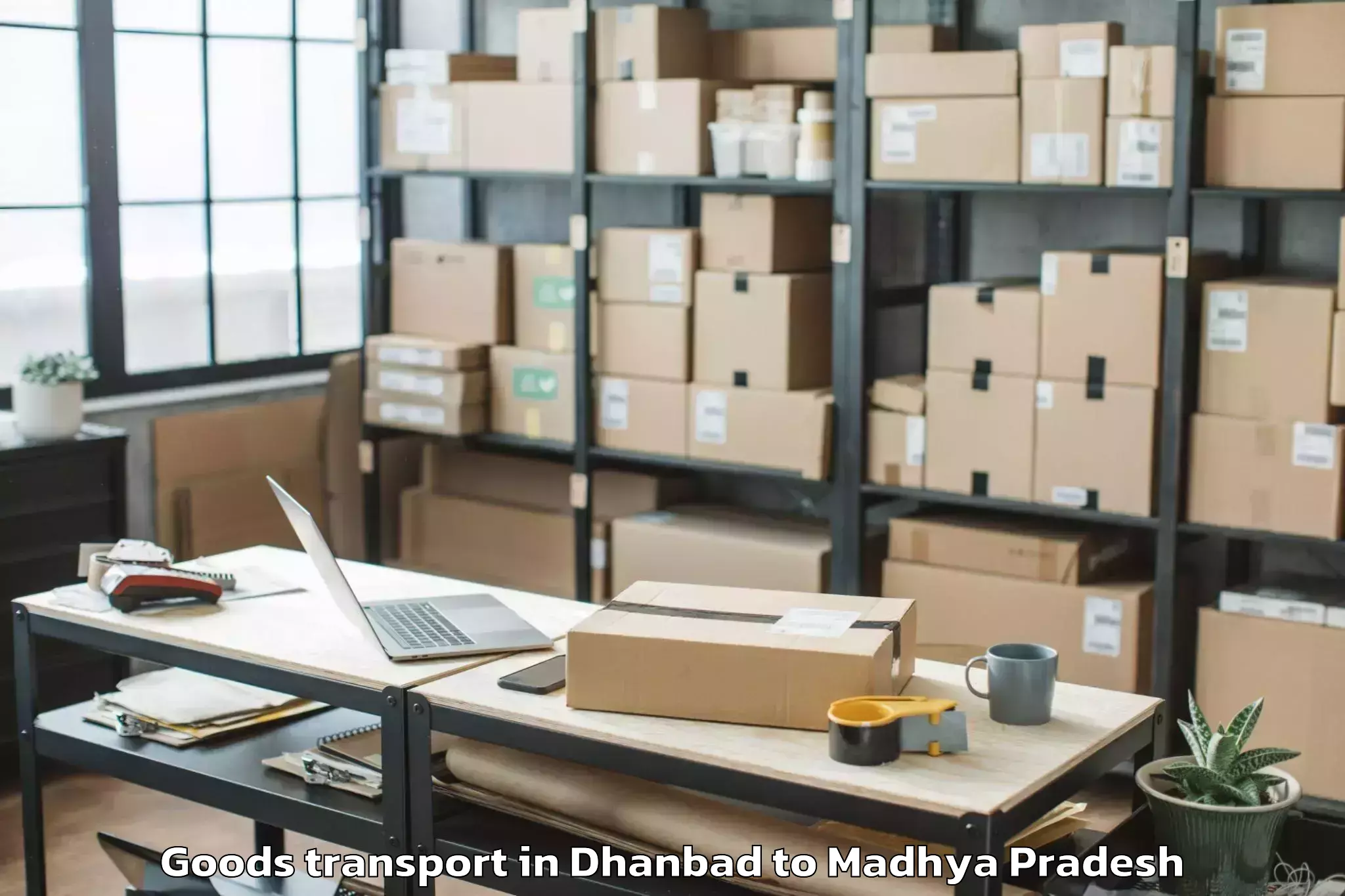 Dhanbad to Mahidpur Goods Transport Booking